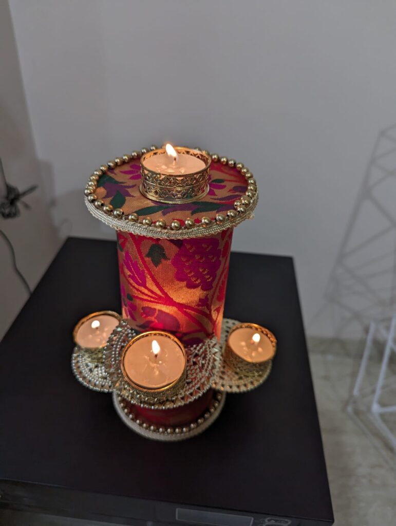 Image shows a handmade candle stand