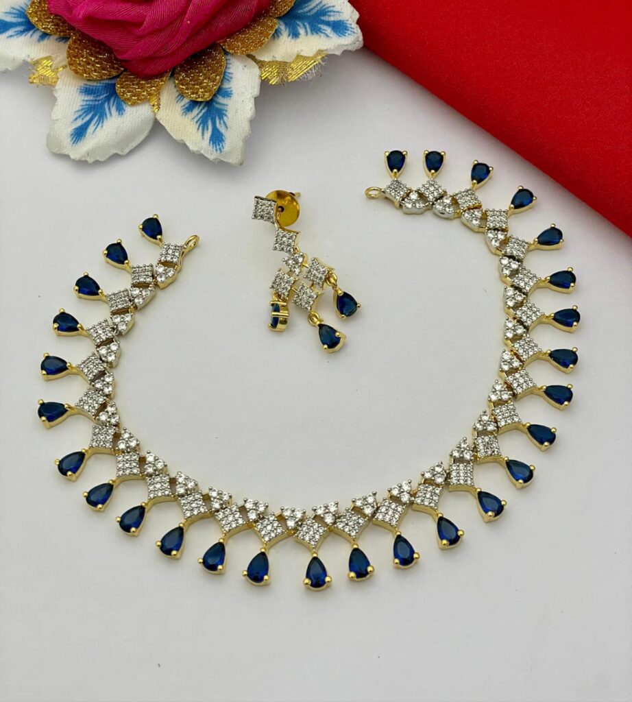 Image shows AD Cubic Zirconia Necklace Set with blue stones