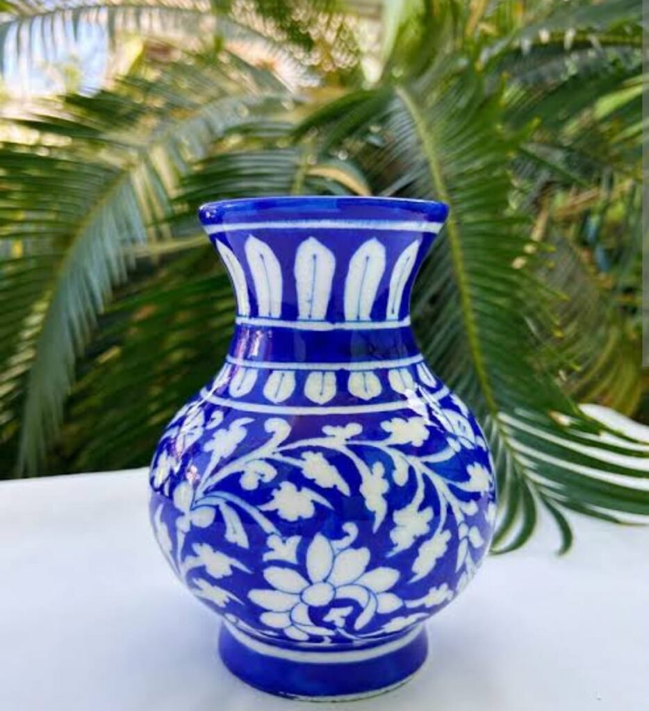 Image shows a Blue Pottery Genie Vase