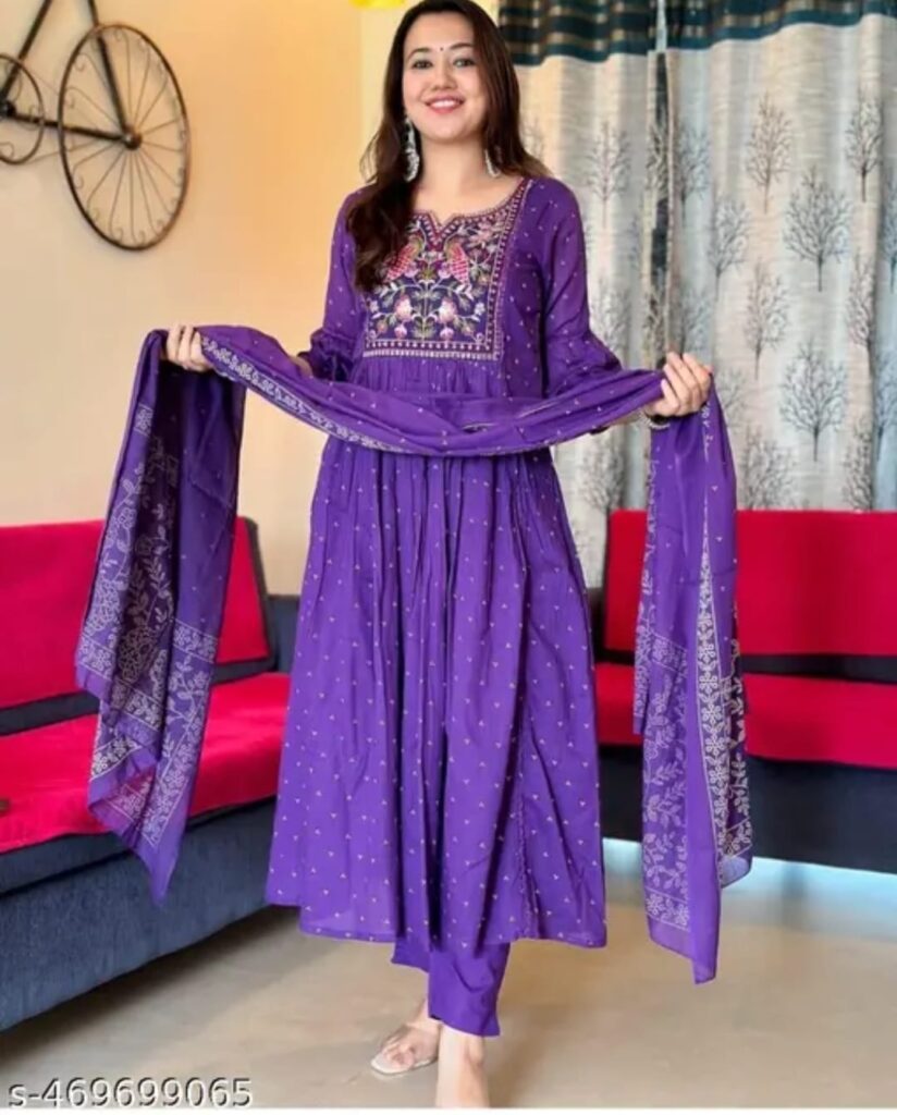Image showas a model wearing COTTON PURPLE SUIT WITH EMBROIDERED YOLK
