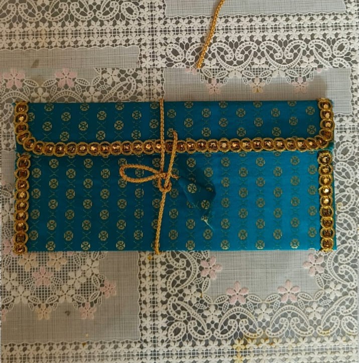 Image shows a handcrafted Gift Envelope from cloth - blue colour