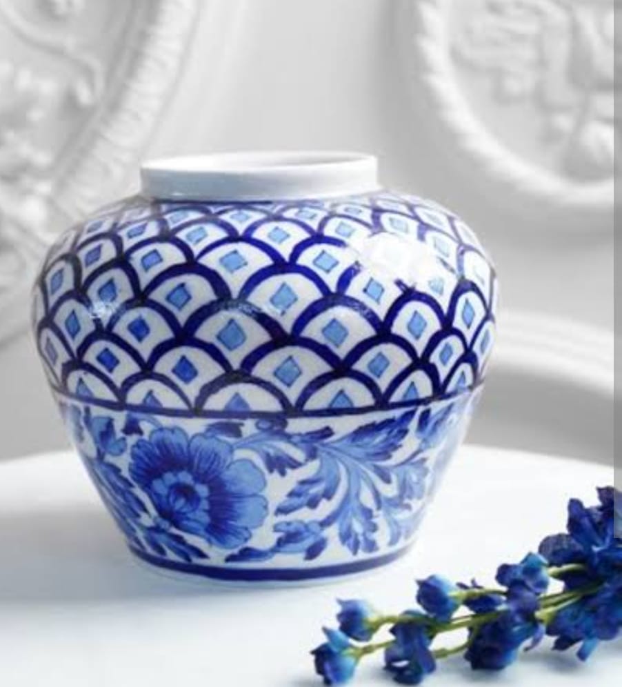 Image shows a blue pottery Handcrafted Cerulean Vase