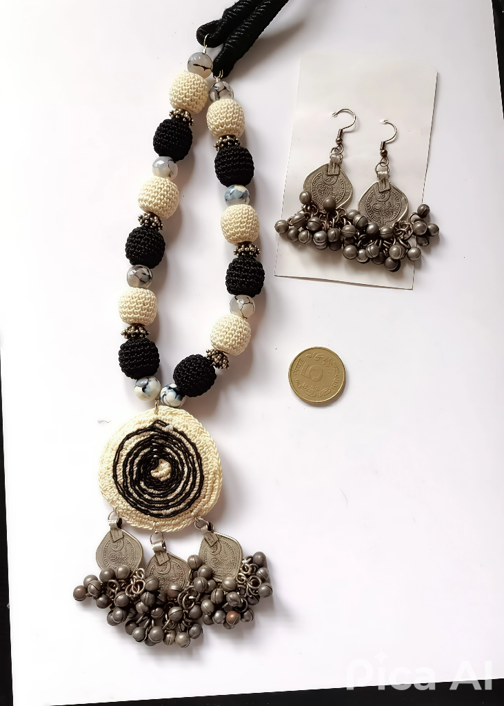 Image shows Handmade jute full set with oxidised pendant and earrings