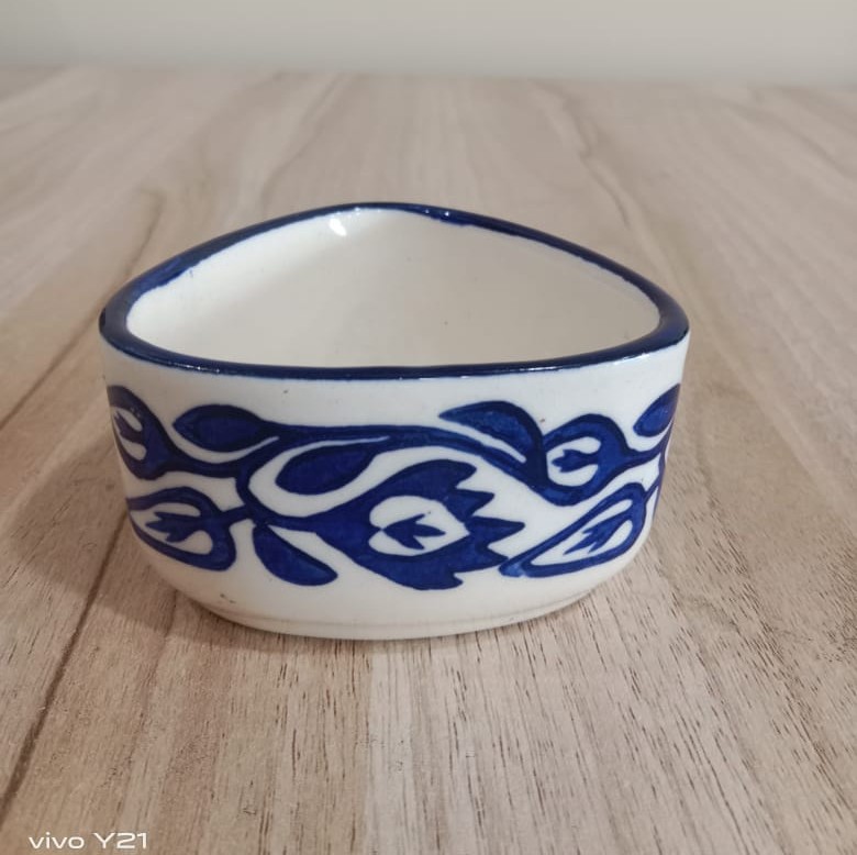 Image shows a blue pottery small bowl