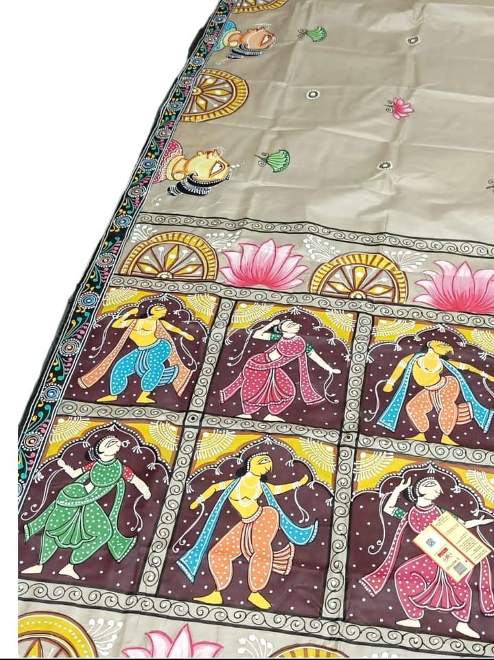 Image shows a Handpainted Pattachitra Folk Art Saree in cream colour