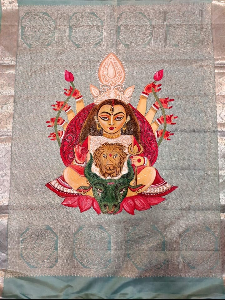 Image of a hand-painted saree showing Goddess Durga.